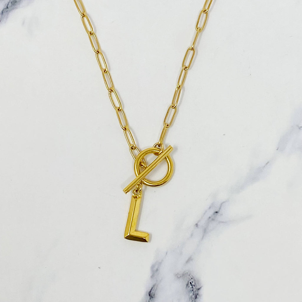 Gold necklace with a initial pendant 