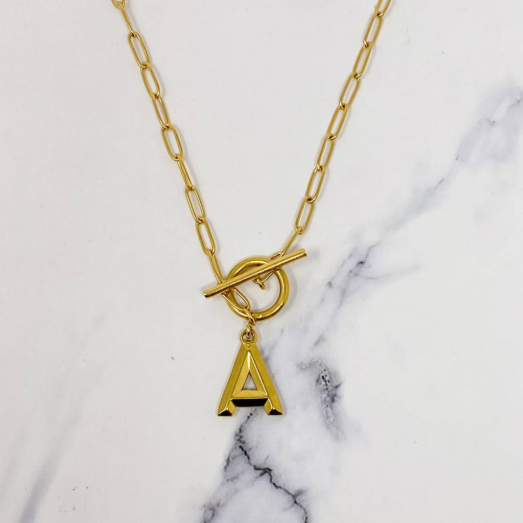 Gold necklace with a initial pendant 