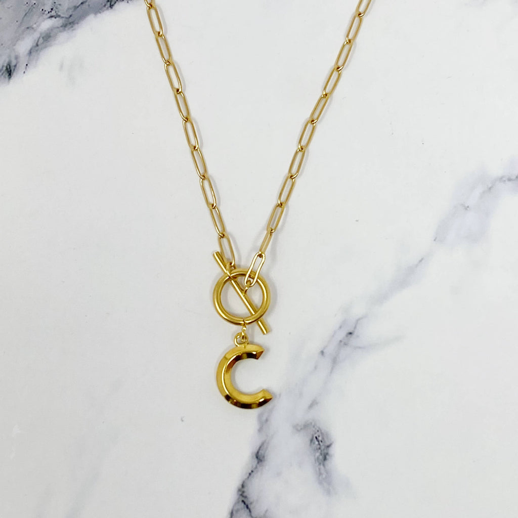 Gold necklace with a initial pendant 