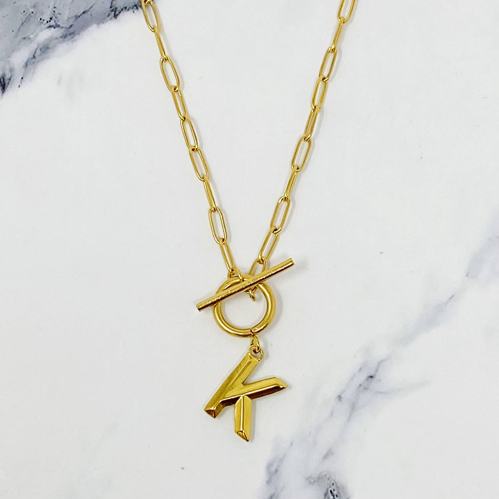 Gold necklace with a initial pendant 