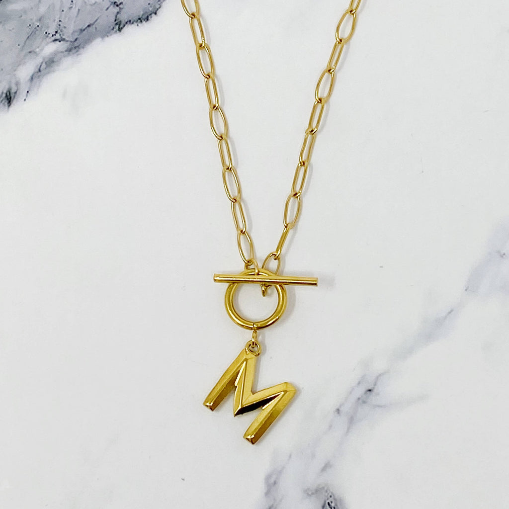 Gold necklace with a initial pendant 