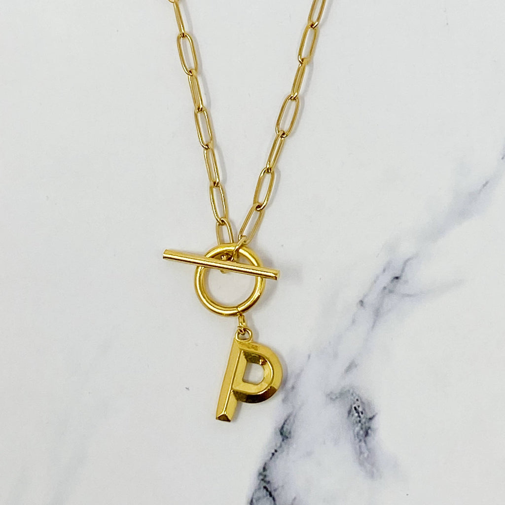 Gold necklace with a initial pendant 
