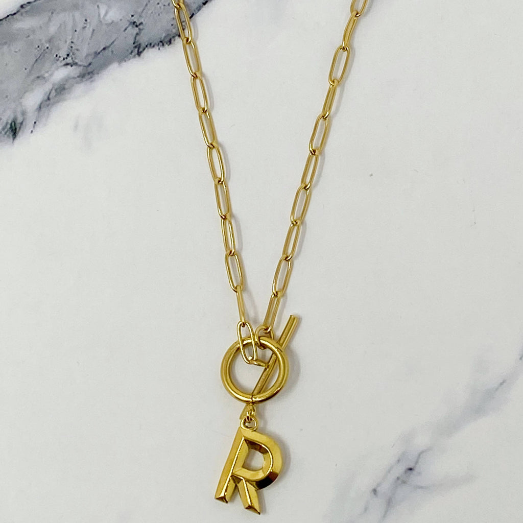Gold necklace with a initial pendant 