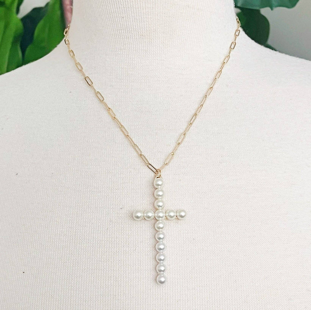 Gold pearl cross necklace